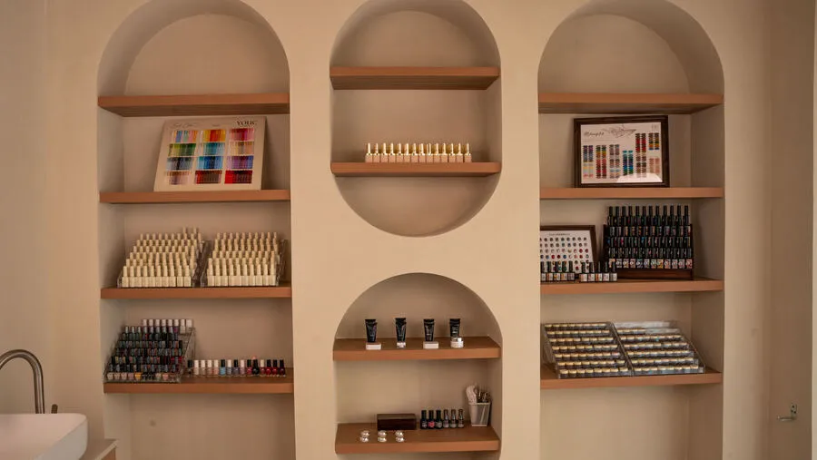 Nail product shelves at Nova Selena Spa