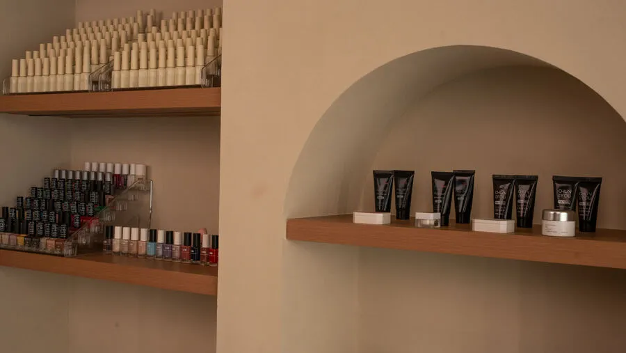 Spa products displayed in arched niches